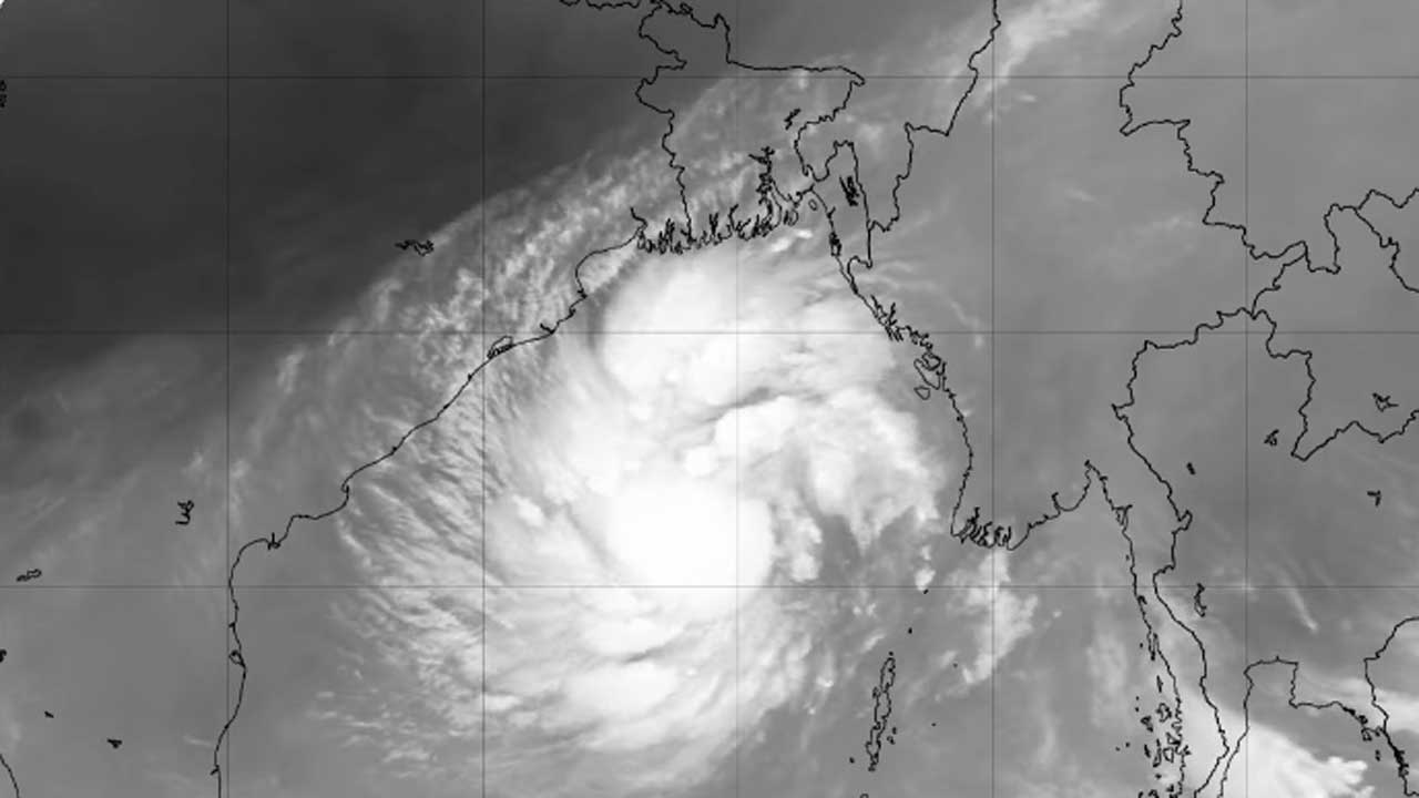 Cyclone 'Dana' forming in the ocean, warning signal number 3